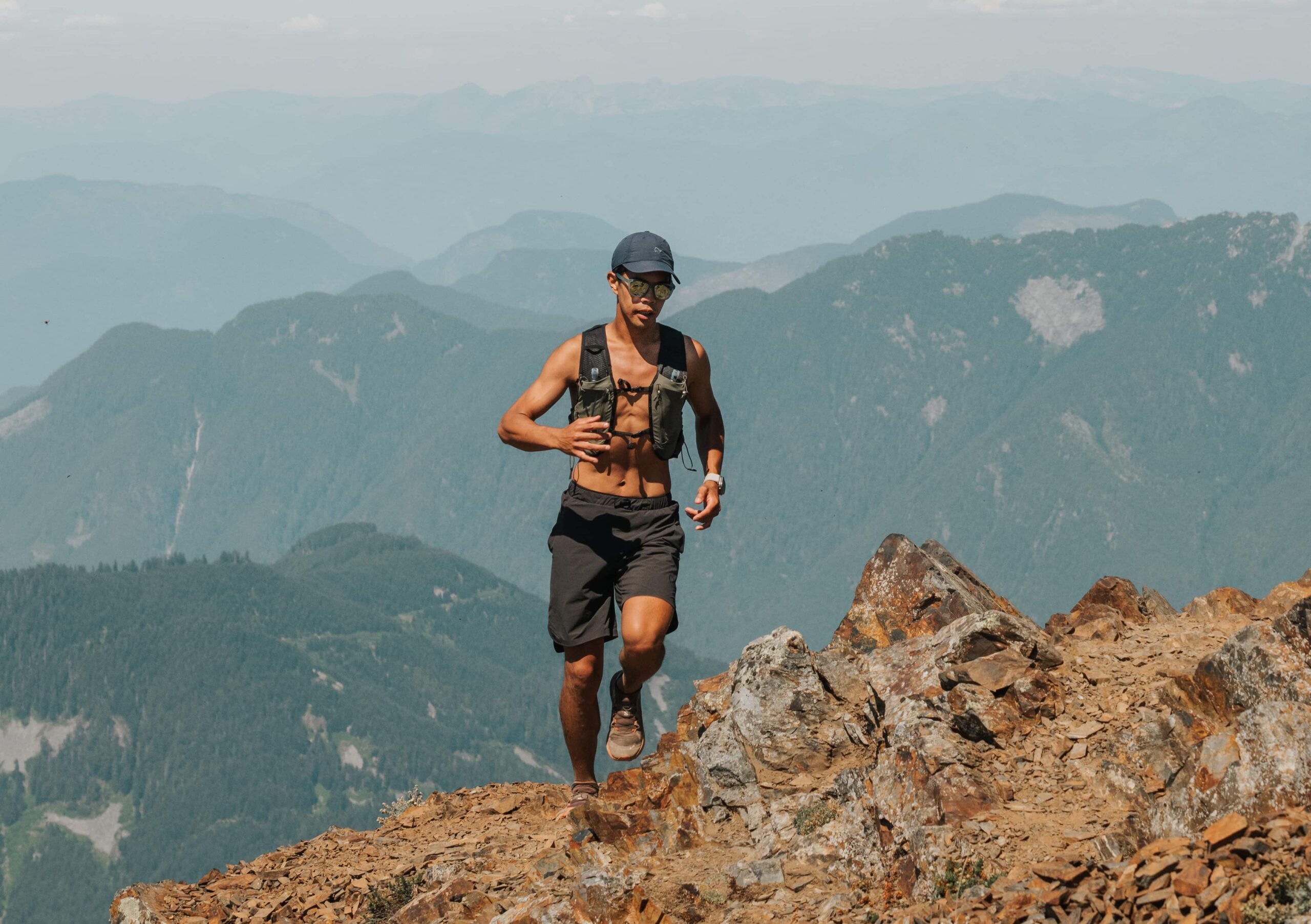 Daniel Leung trail running in the mountains